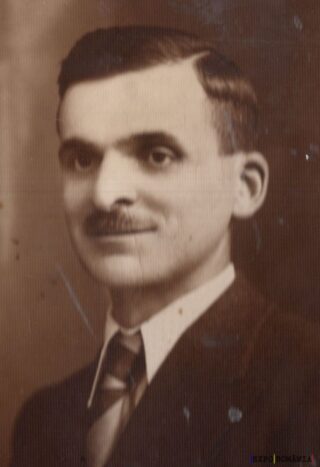 Portretul unui bărbat în costum