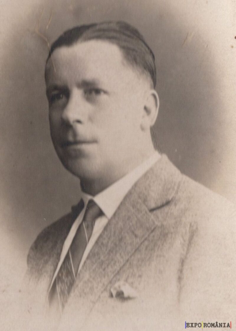 Portret alb-negru al unui bărbat în costum