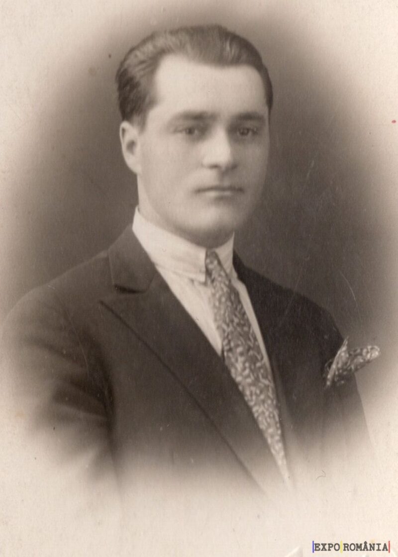 Portret alb-negru al unui bărbat elegant