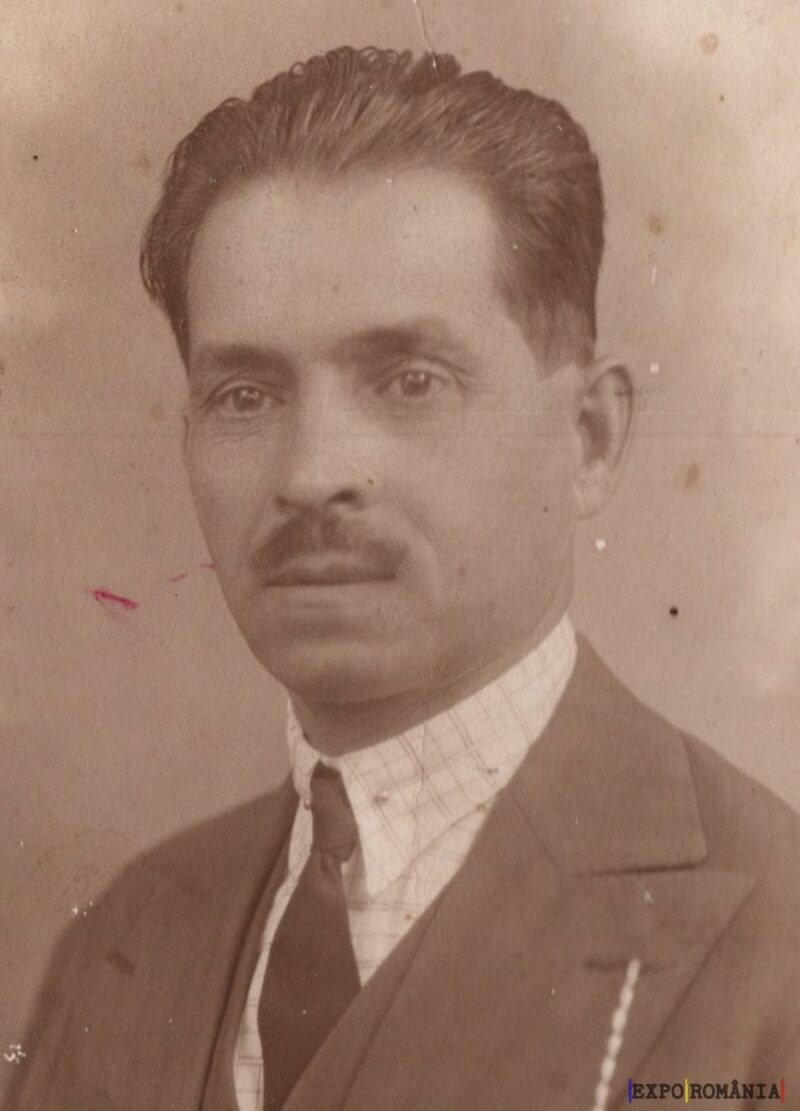 Portret alb-negru al unui bărbat în costum