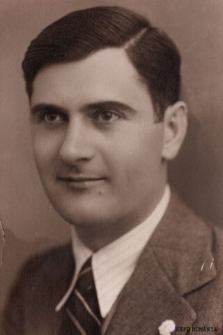 Portret alb-negru al unui bărbat elegant