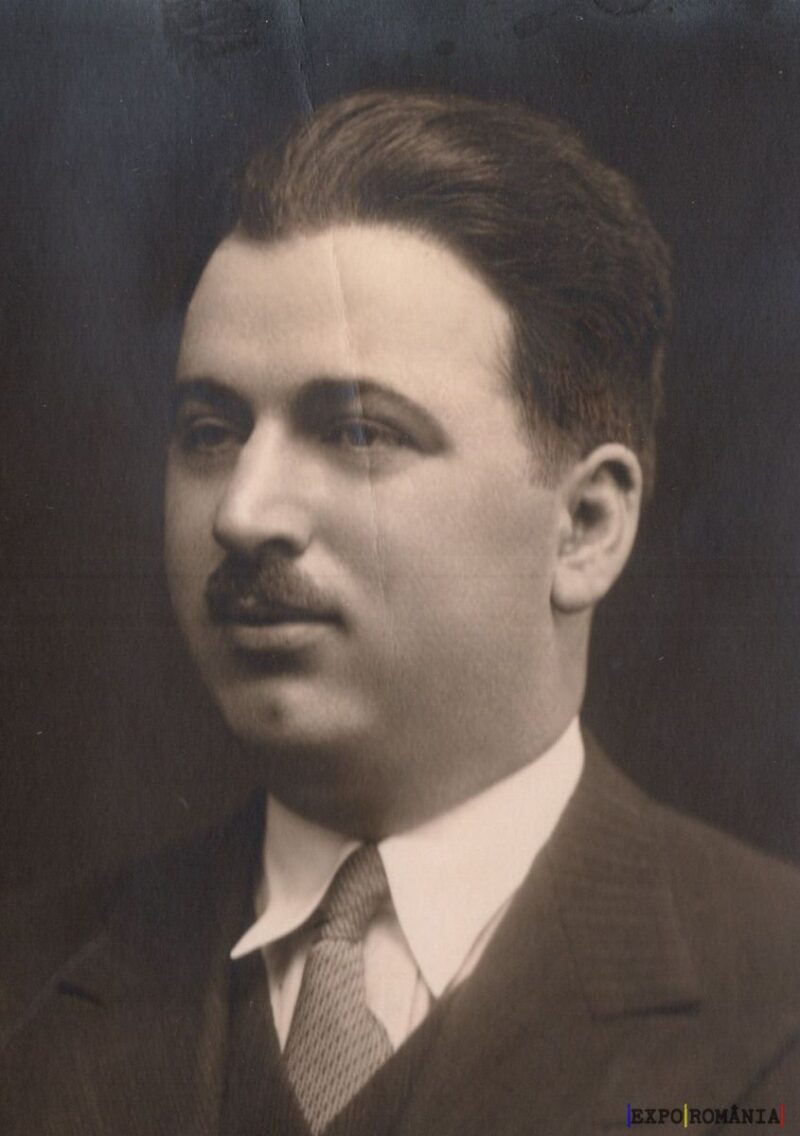 Portret alb-negru al unui bărbat în costum