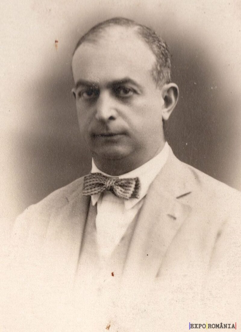 Bărbat în costum purtând papion