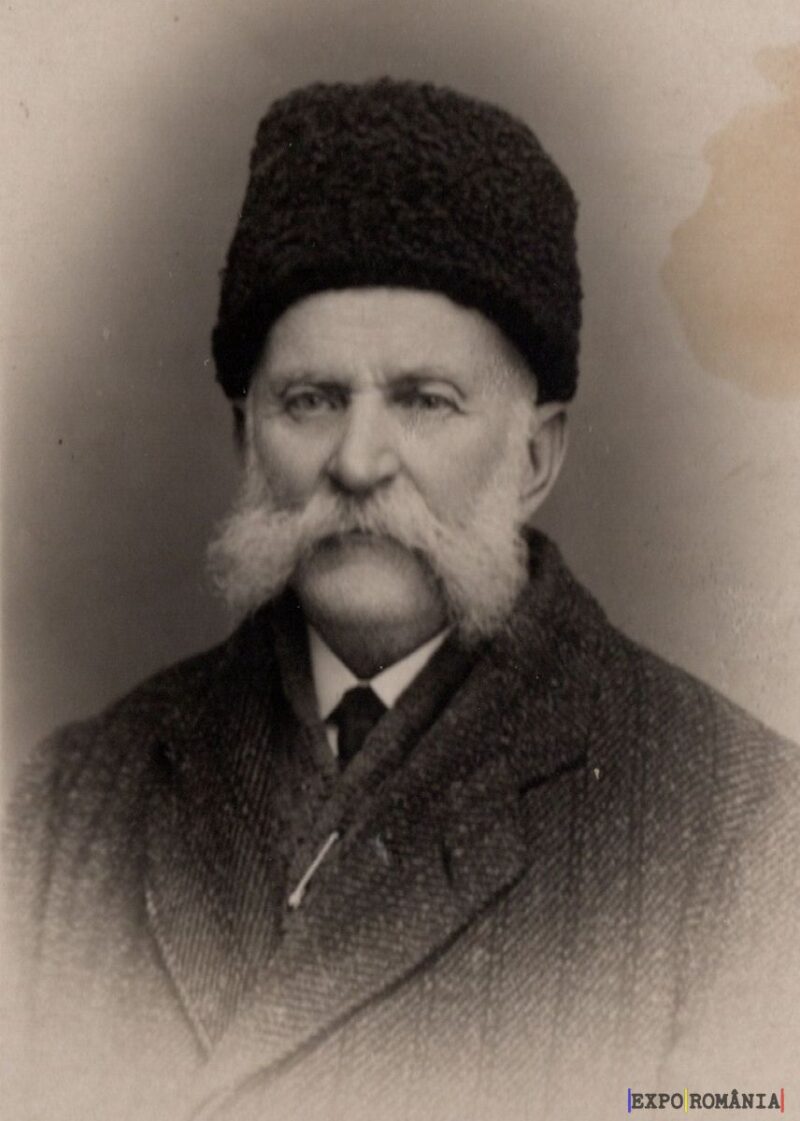 Bărbat cu căciulă tradițională și mustață impunătoare