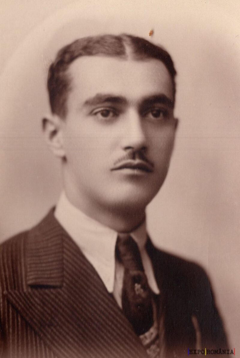 Tânăr elegant purtând costum și cravată