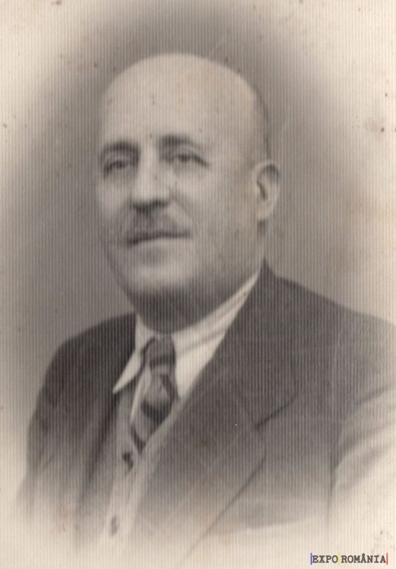 Portret alb-negru al unui bărbat în costum