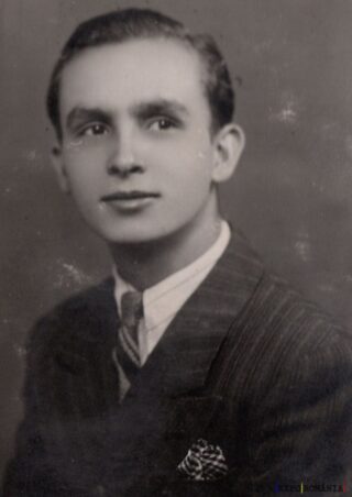 Portret alb-negru al unui tânăr elegant